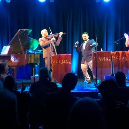 Julian Ferraretto performing live with Zooma Zooma